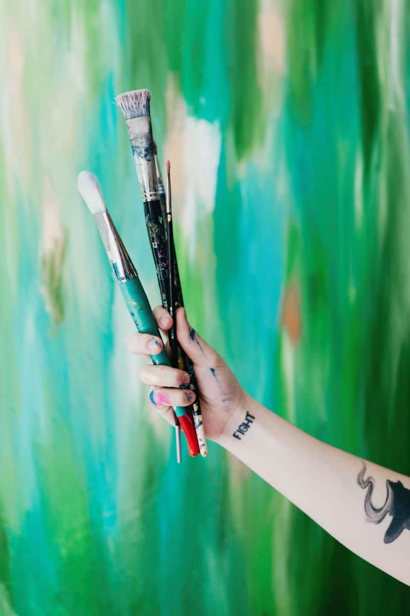 Artist Taylor Lee Green Painting and Paint brushes